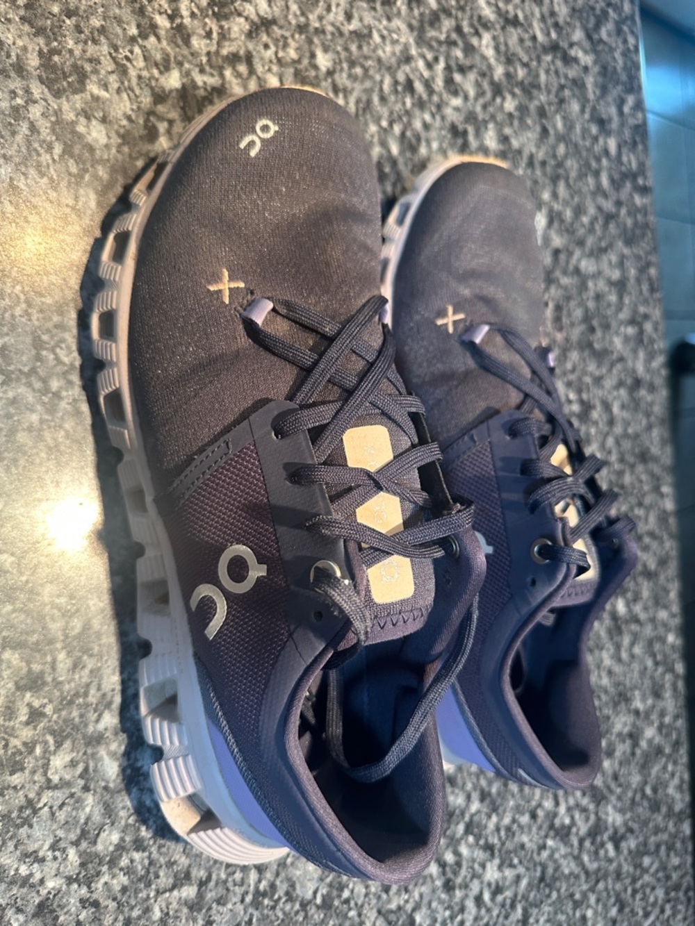 On Running Women’s Shoes in Dark Purple with Tan Details